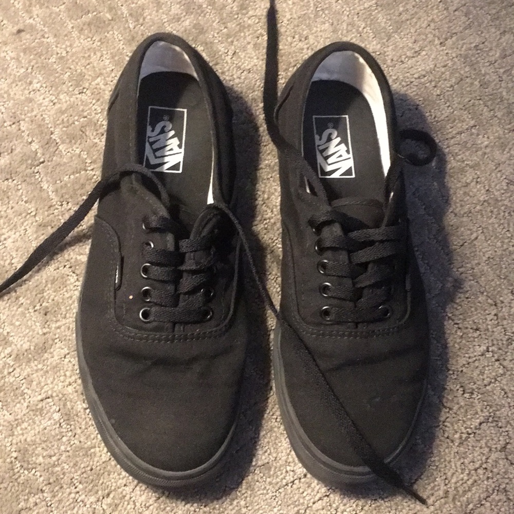 Black lace-up Vans